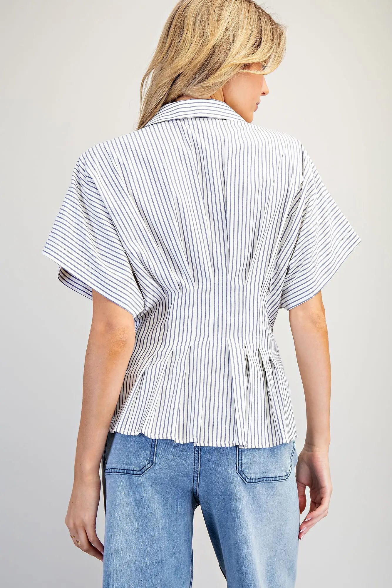 Striped pleated button down top with peplum hem