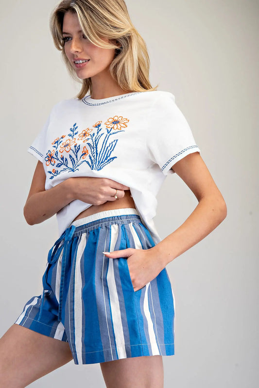 Stripe Drawstring Shorts feature a relaxed fit with classic vertical stripes and an easy elastic waistband