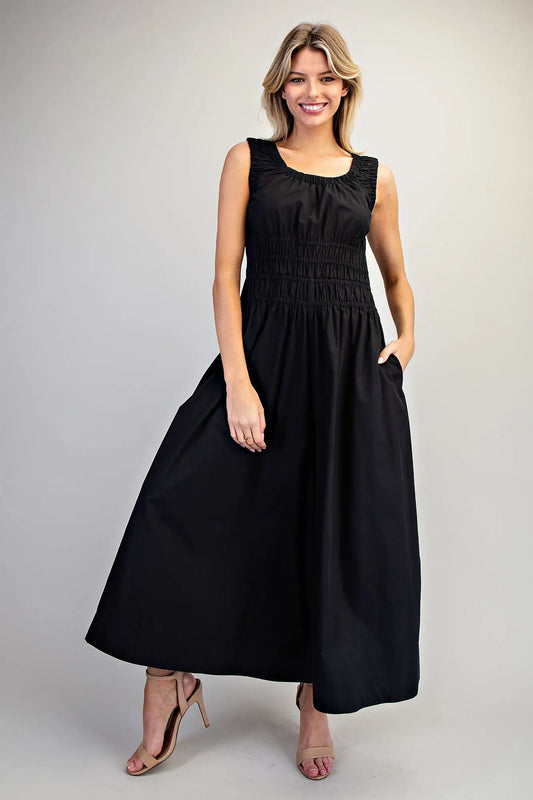 Sleeveless wide-leg jumpsuit with ruched waist and scoop neckline