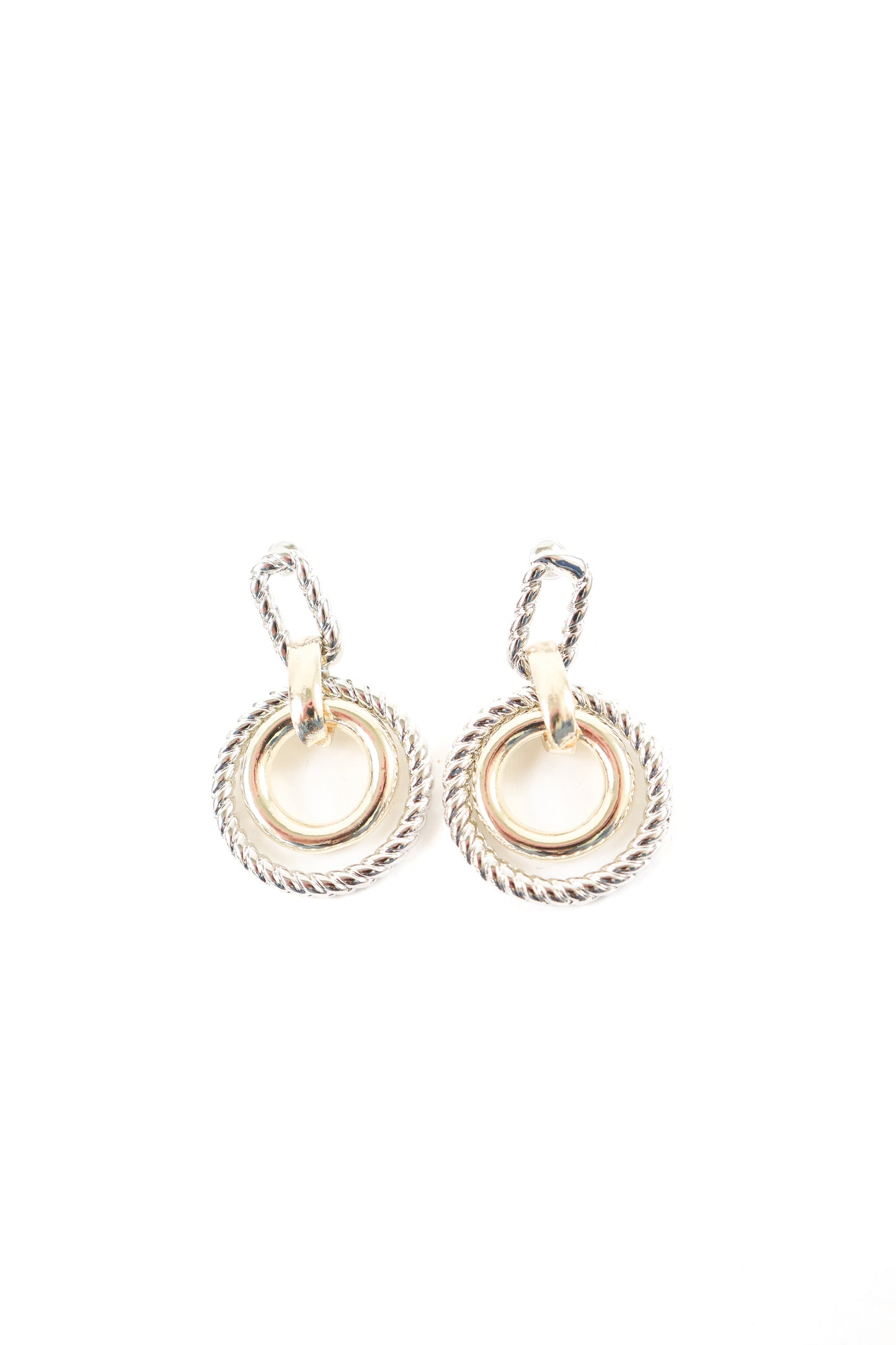 Mixed metal gold and silver rope detail drop earrings with circular design, women’s boutique statement jewelry.