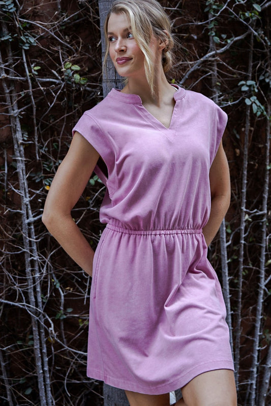 Mineral washed cotton sleeveless mini dress with cinched waist.