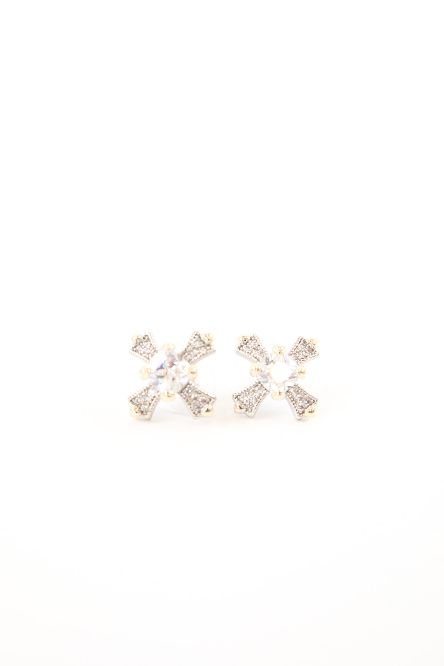 Gold and silver pavé cross stud earrings with round crystal center stone, women’s boutique statement jewelry.