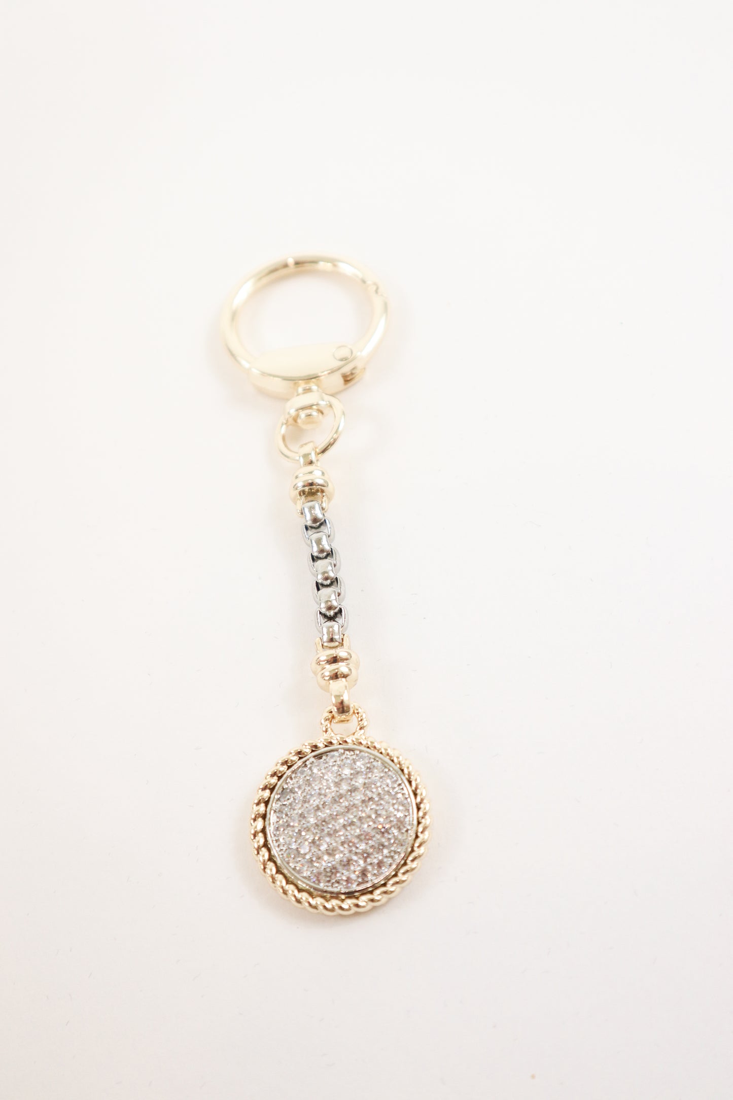 keychain with textured detailing and rope edge