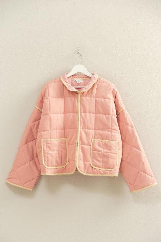 The Rowena Quilted Utility Jacket combines timeless structure with everyday function.