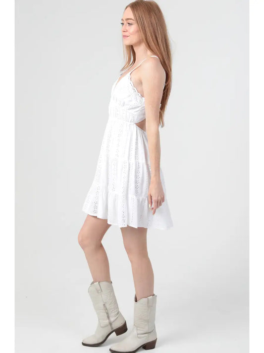 Eyelet embroidered mini dress with lace trim and an open tie back
