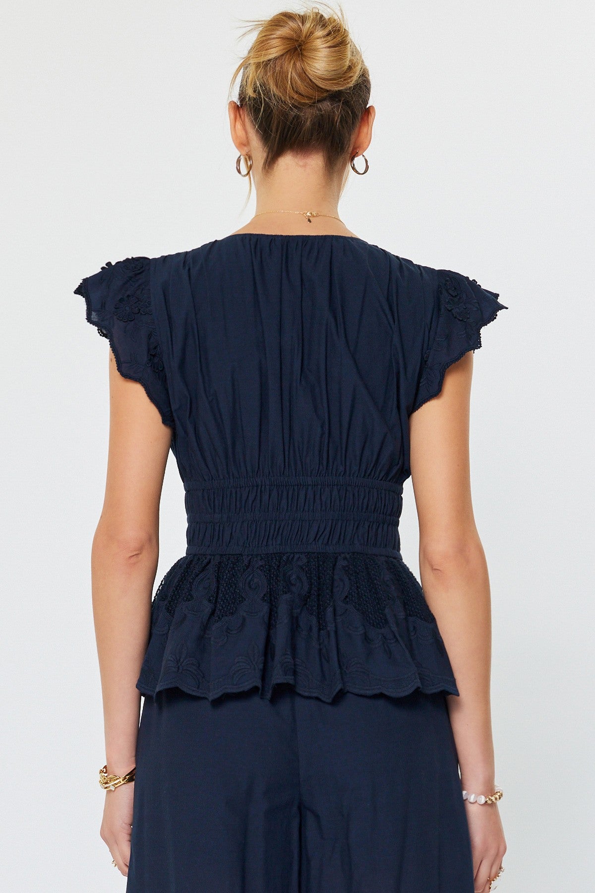 embroidered cotton peplum blouse with flutter sleeves