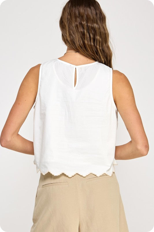 cropped sleeveless cotton tank with floral embroidery, scalloped hem, and keyhole back closure