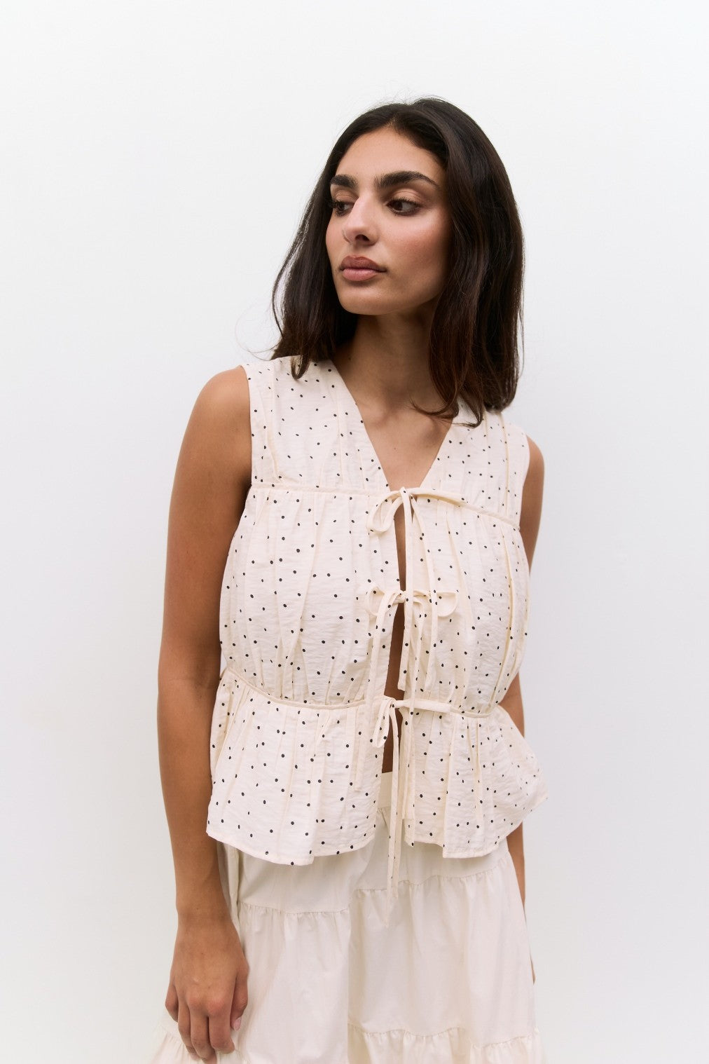 ightweight tiered V-neck blouse with front ties
