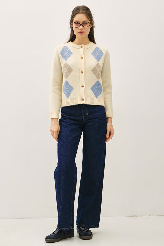 A timeless cardigan with a soft, cozy feel and elegant horn button detailing.