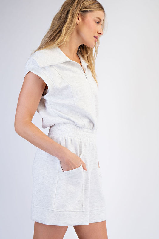 Lightweight modal blend romper with dropped armholes and diagonal pockets