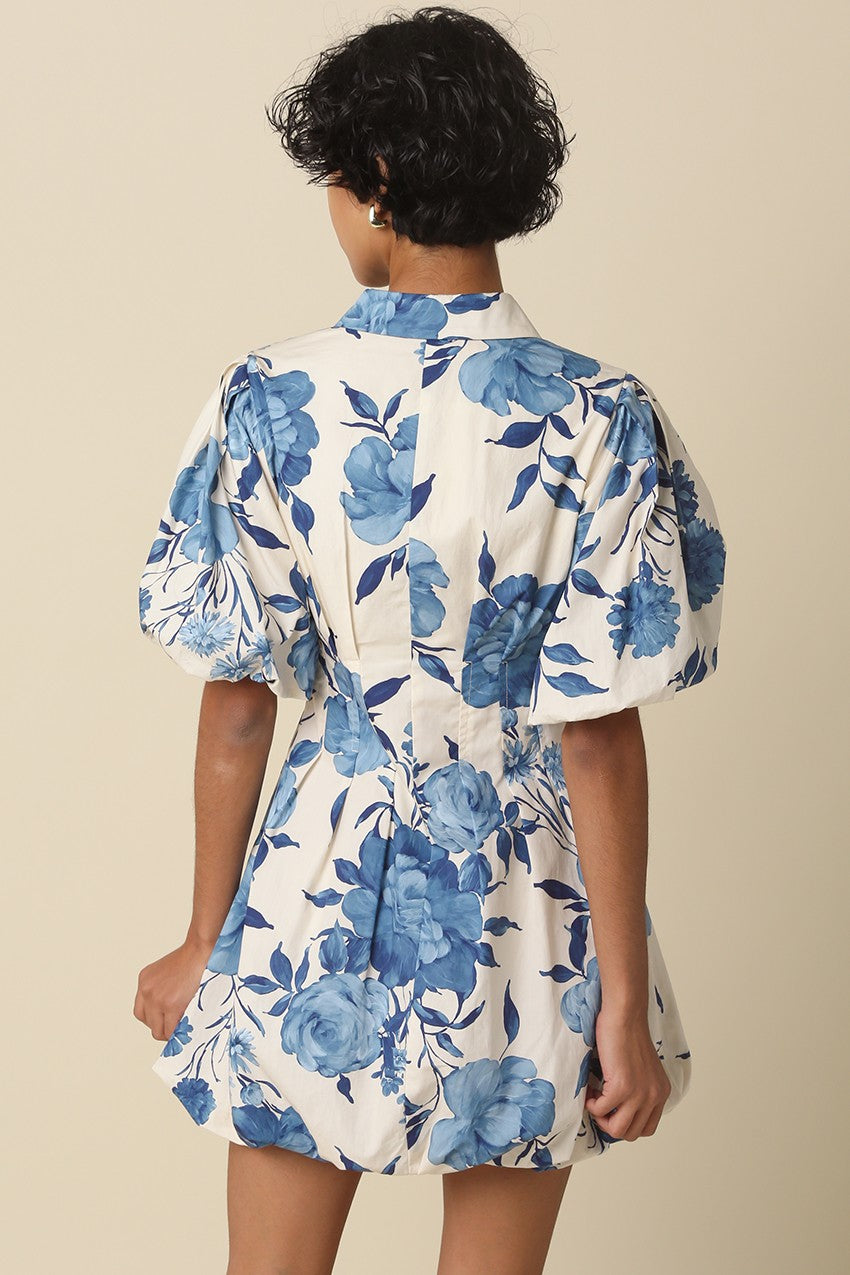 Floral bubble dress with pointed collar, short sleeves, and voluminous flared hem