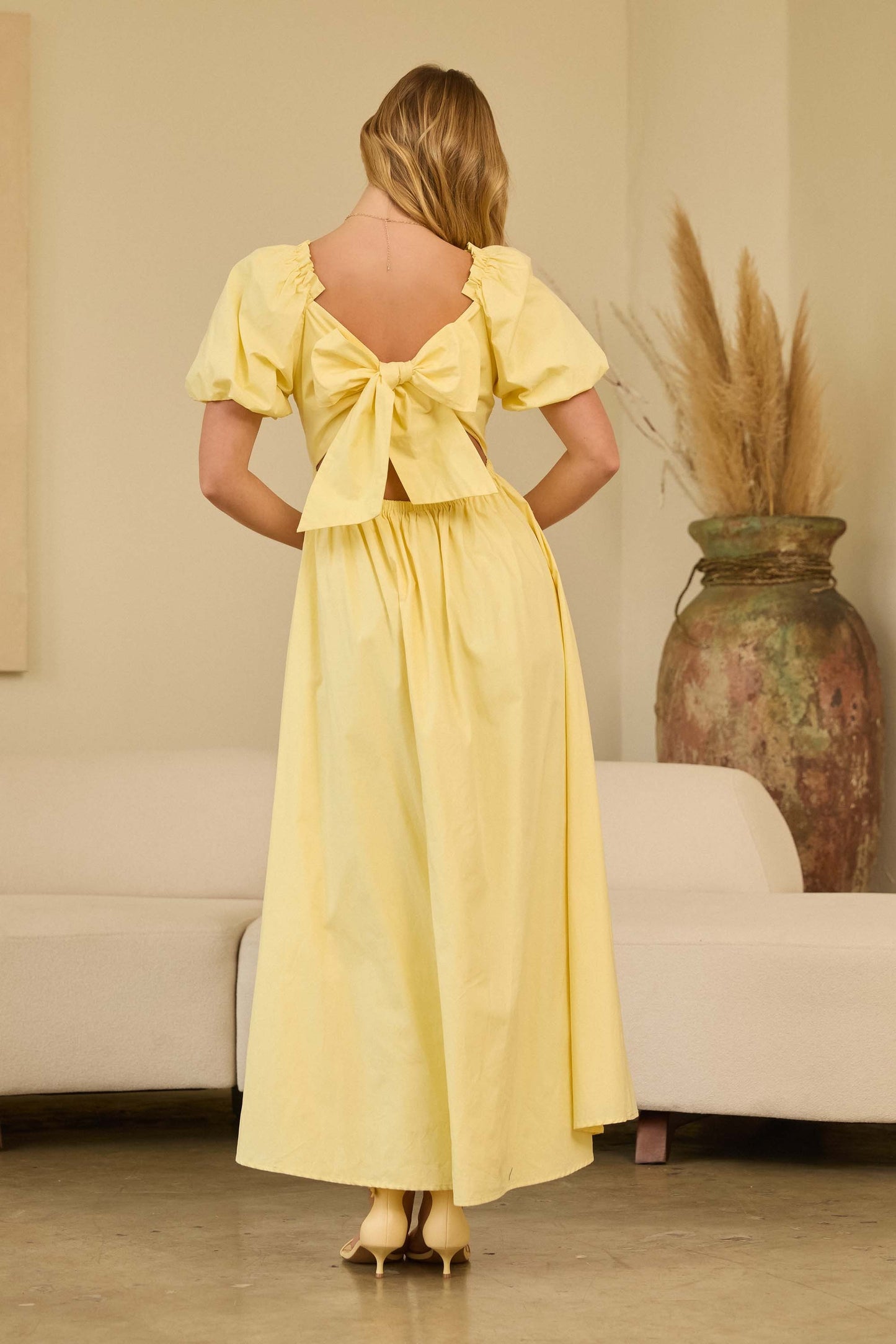 Bubble sleeve maxi dress with flowy silhouette for spring occasions