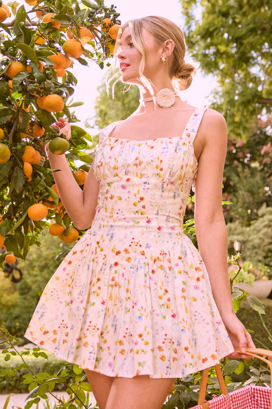 Women’s printed mini dress with integrated shorts and lightweight fabric