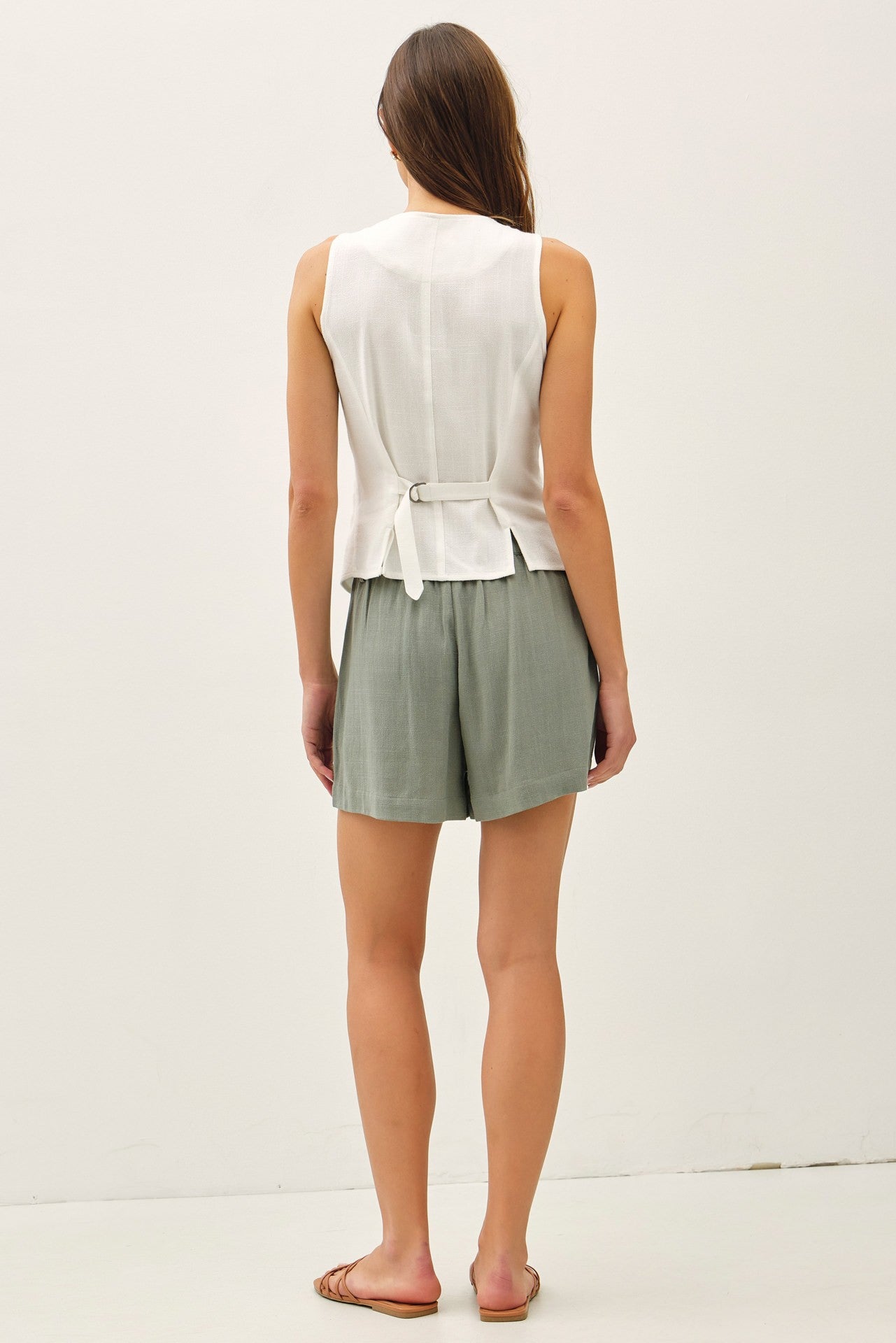 linen-blend suit vest with a V-neckline and adjustable back belt