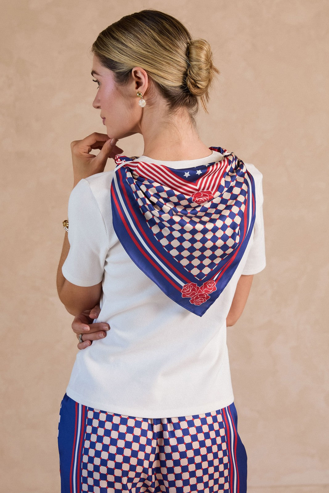 Ribbed knit top paired with a matching geo checkerboard printed scarf