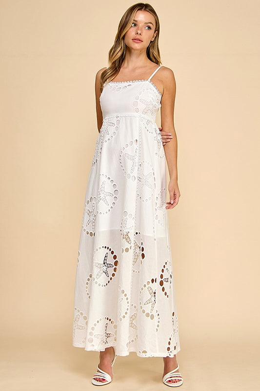 embroidered broderie cotton maxi dress with delicate lace trim and a flowing silhouette