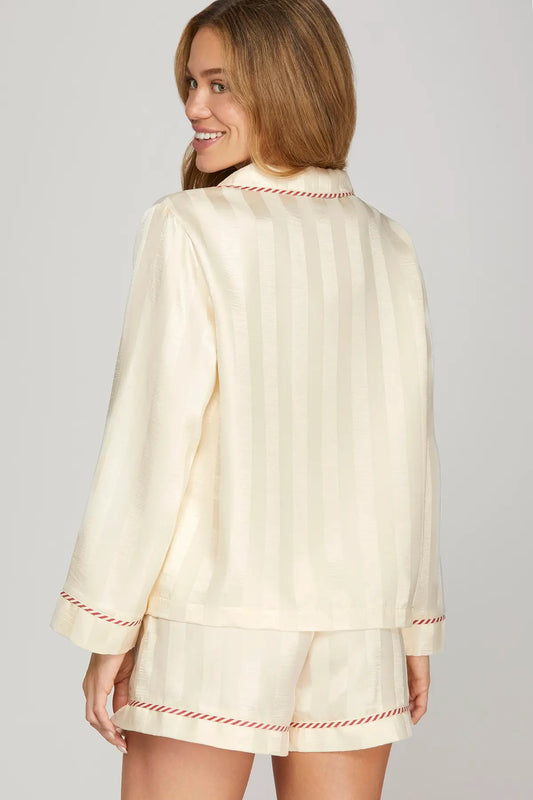 The Thalia Contrast Piped Pajama Set combines classic tailoring and silky comfort for effortlessly elegant lounging.