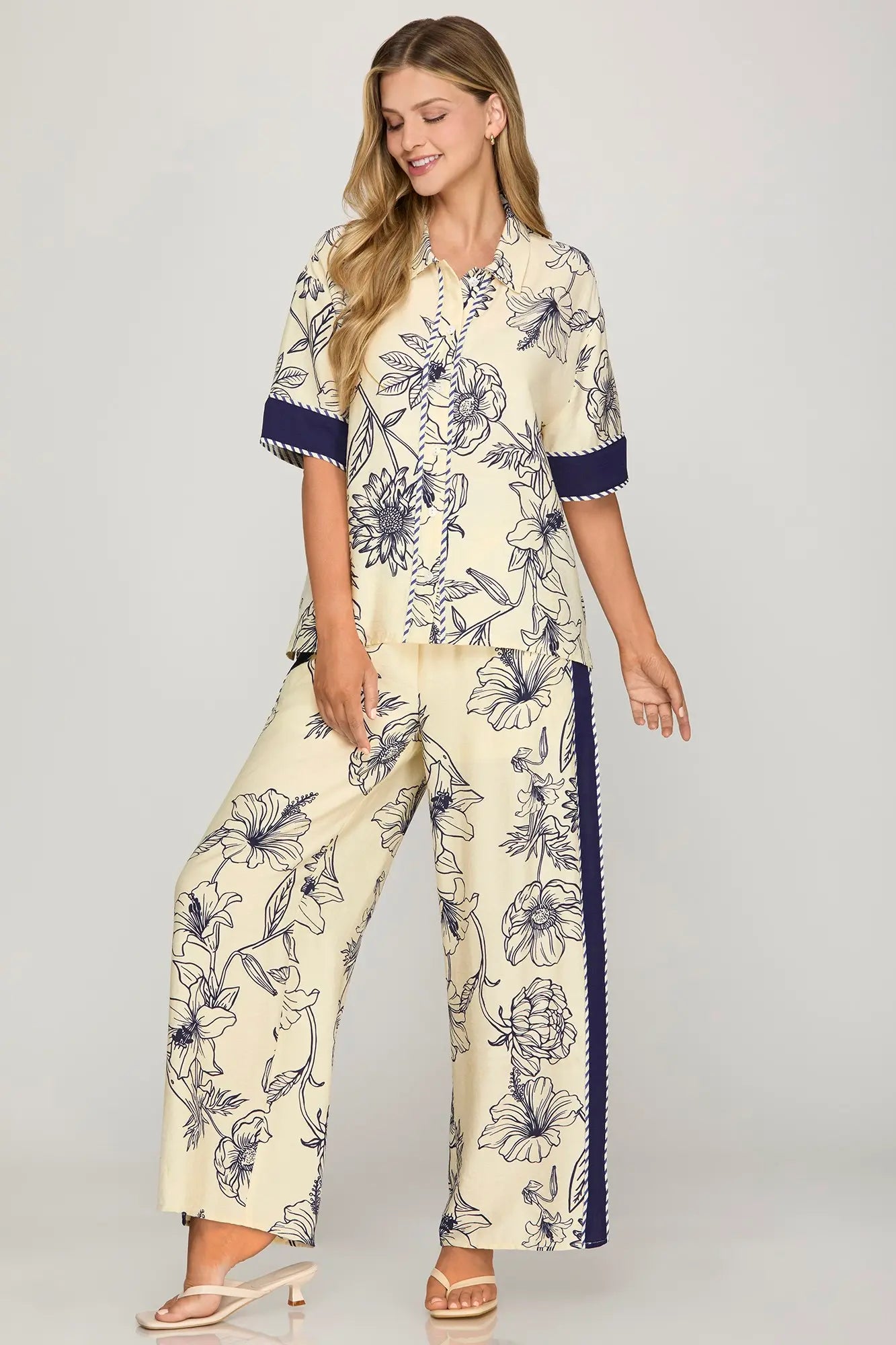 Woven print pants with contrast trim, elastic waistband, and pockets