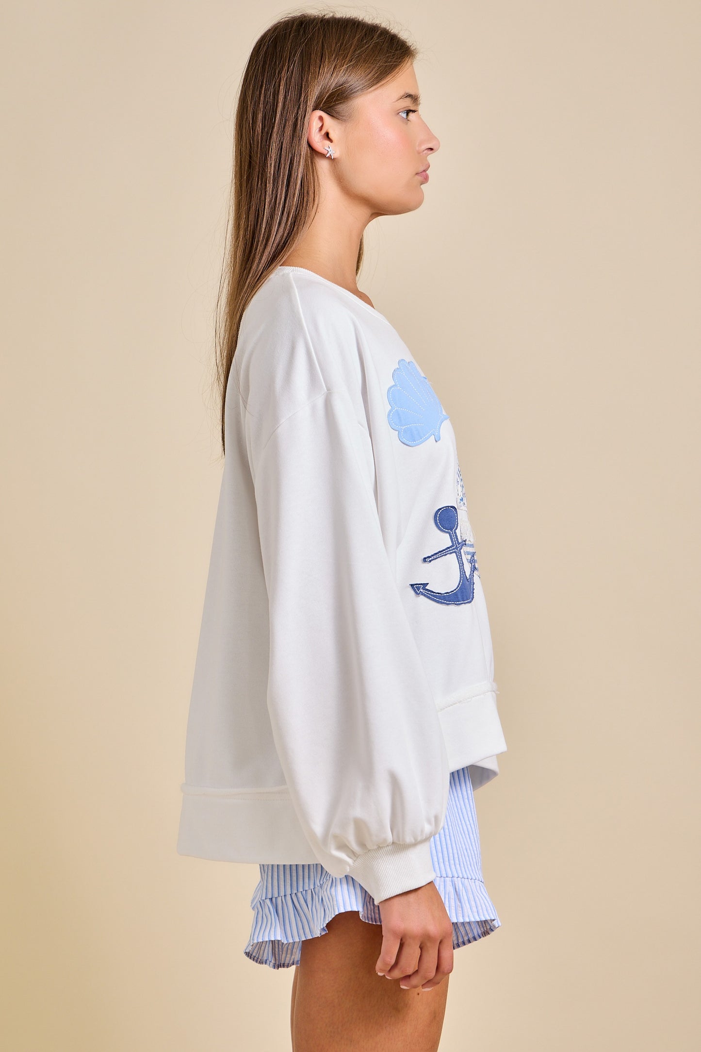 Oversized nautical sailboat patchwork sweatshirt in cotton blend fabric.