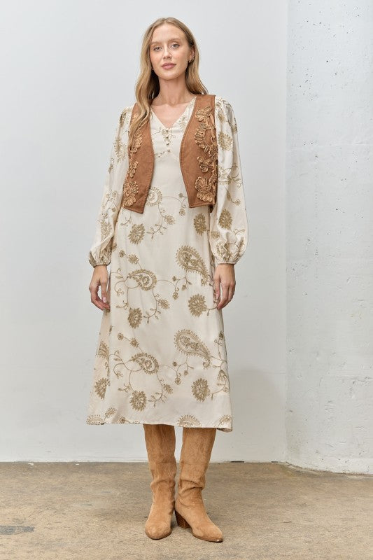 The Lucinda Suede Embroidered Vest adds Western-inspired charm and texture to any look with its soft faux suede and intricate stitching.