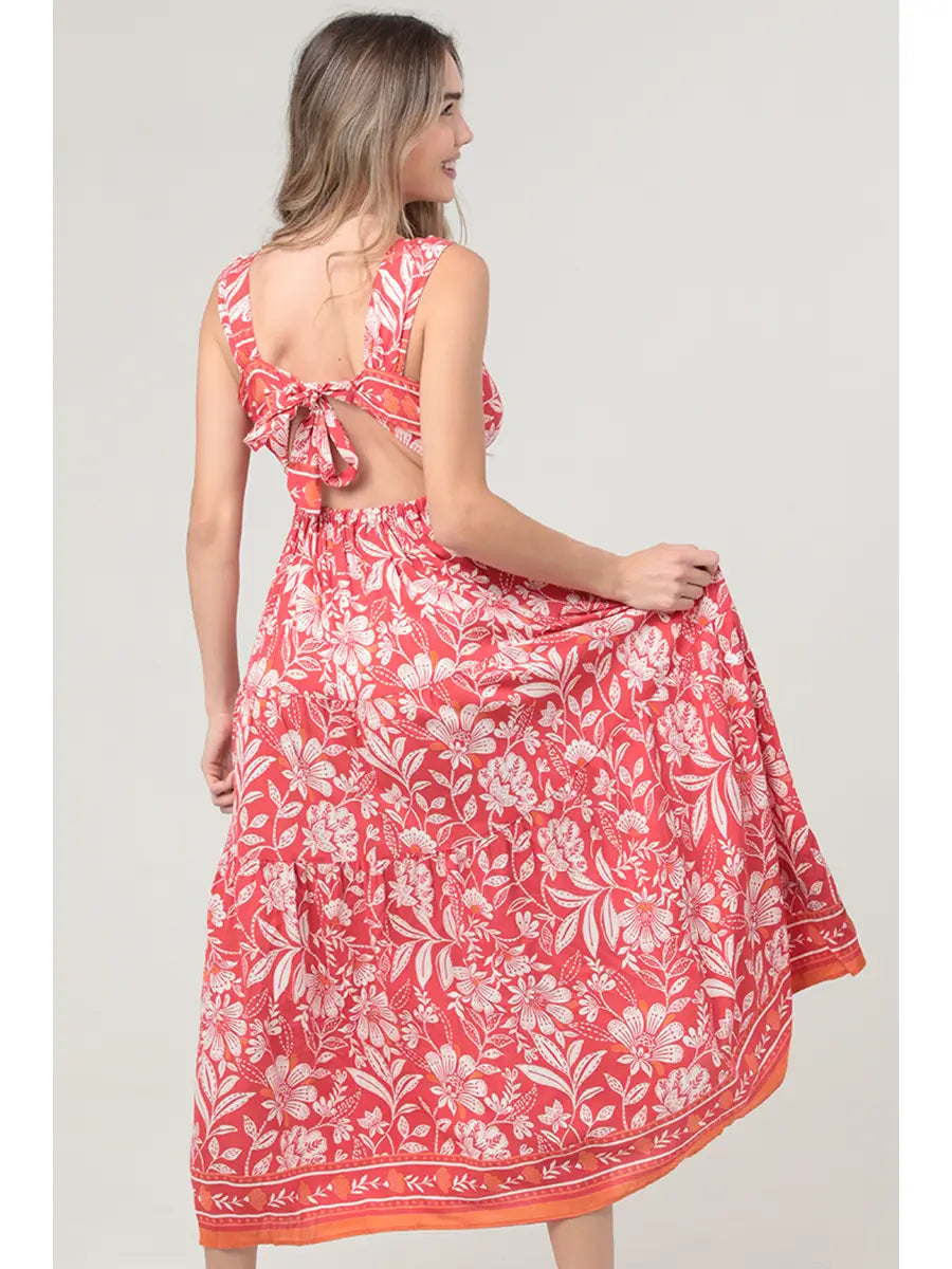 Bohemian floral maxi dress featuring an open back and side slit