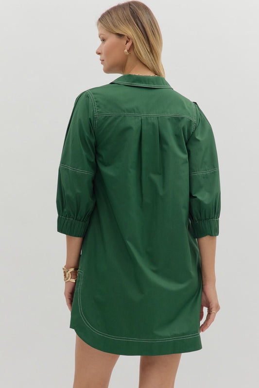 A charming lantern sleeve mini dress with contrast stitching and pockets—your go-to for effortless summer style.