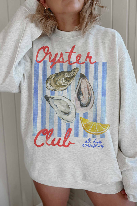 A cozy, coastal-inspired sweatshirt featuring bold "Oyster Club" graphics and premium cotton comfort.