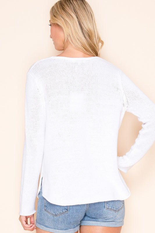 A lightweight V-neck sweater top with a bold USA design, crafted in a breathable cotton
