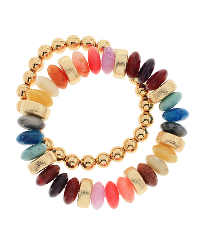 Alyssa Bracelet Set featuring vibrant multicolored resin beads with textured gold-tone spacers on stretch cord, arranged in a playful stack.