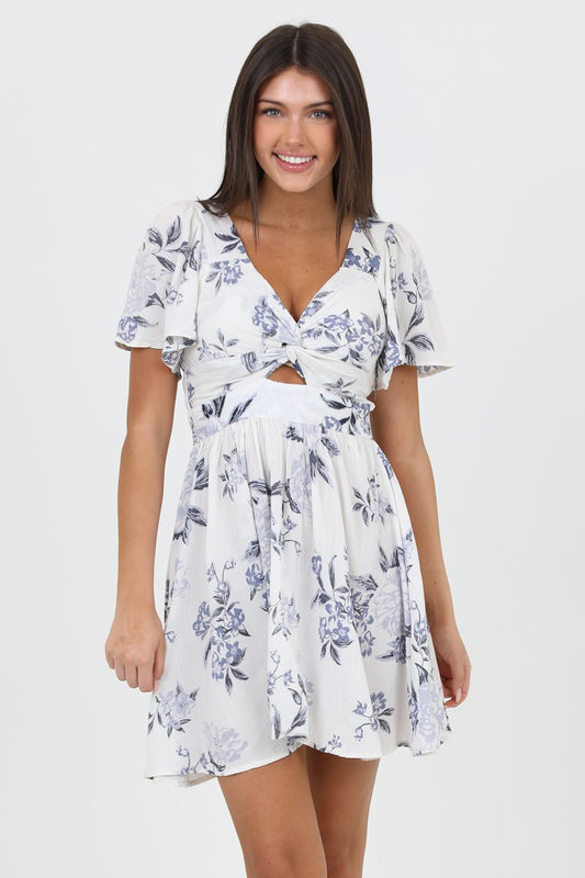 Blue Blossom Knot-Front Dress with a feminine floral print, featuring a front knot cutout and flowy silhouette.