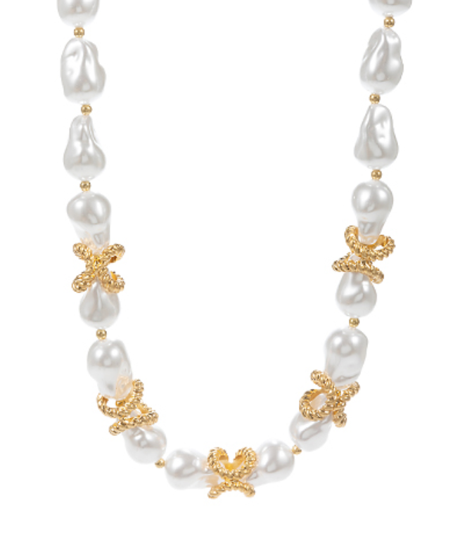 Brilliance Knot Pearl Necklace featuring luminous baroque pearls and intricate golden knot accents.