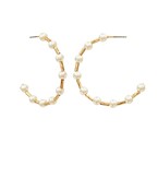 Gold hoop earrings with pearl accents, combining classic elegance with a modern