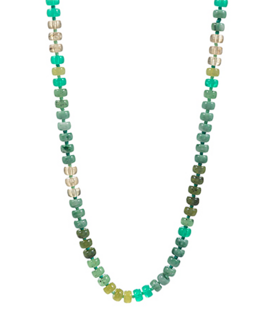 A vibrant collection of three separate necklaces, each composed of small, flat, oval or disc-shaped beads strung closely together. One necklace features a gradient of pink, purple, and reddish-brown hues. Another showcases a spectrum of greens and light beiges. The third displays a full rainbow gradient from red to blue/green. Each necklace subtly changes color along its length.