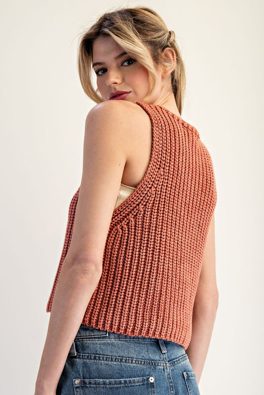 Cropped cotton knit vest with a deep V-neckline and button-down front.