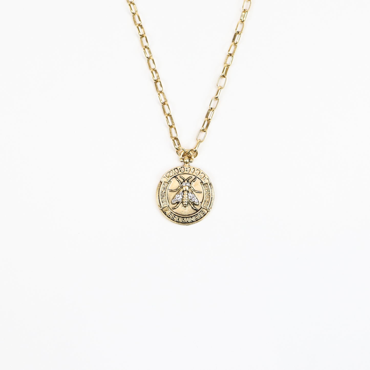 handcrafted 22K gold-plated bee medallion necklace featuring a detailed honeybee engraving with sparkling crystal accents, suspended from a chic gold link chain for a luxurious, nature-inspired look.