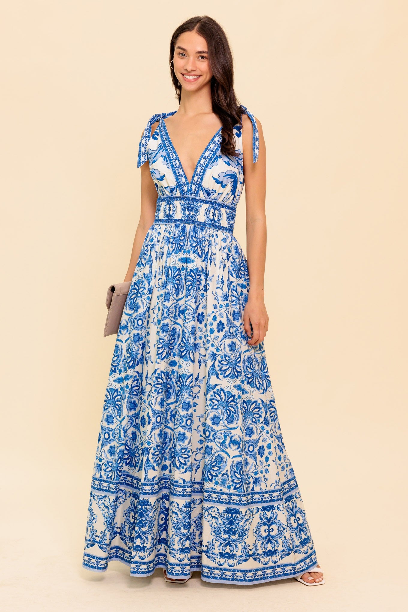 Embrace effortless elegance with the Ida Dress, a breezy blue-and-white maxi dress inspired by Mediterranean charm, perfect for summer days and special occasions.