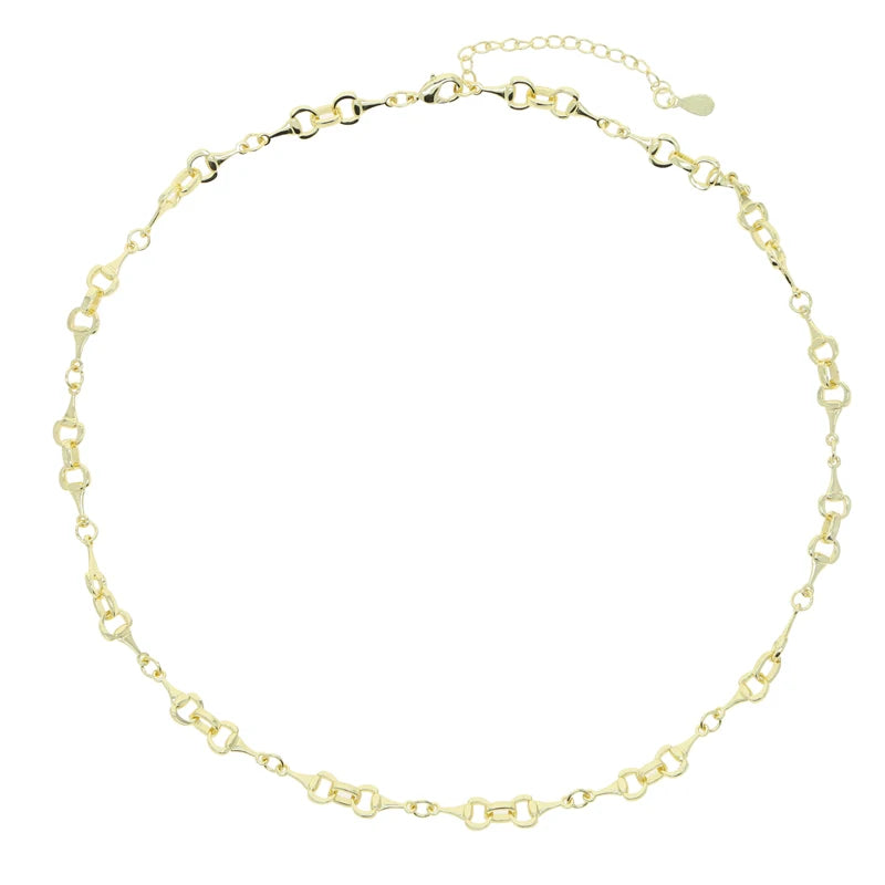 Gold snaffle bit link necklace featuring equestrian-style links and polished finish