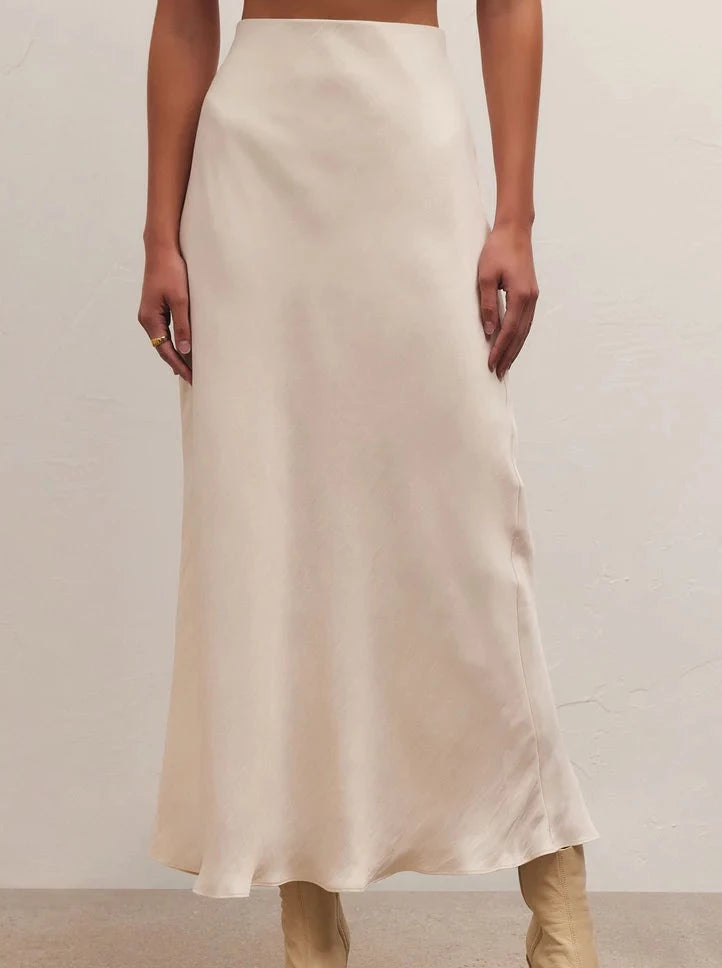 Sandstone-colored satin midi skirt with a high-waisted design and a sleek, fluid drape for a timeless and elegant look.