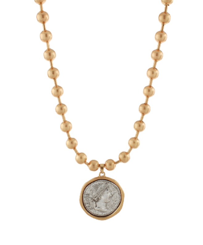 Elegant beaded chain necklace with a vintage-inspired coin pendant, exuding classic sophistication.