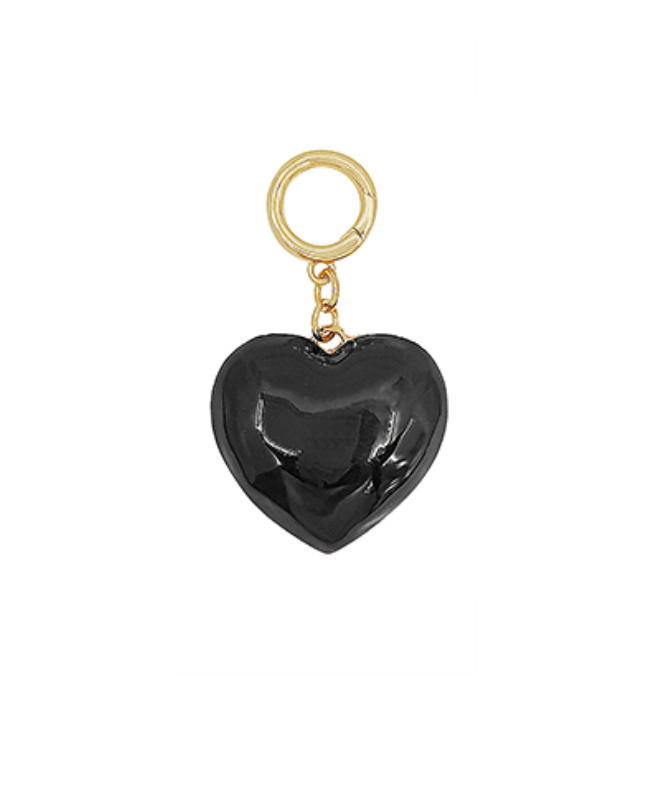 Black enamel heart charm with gold clasp on white background — stylish heart pendant accessory.