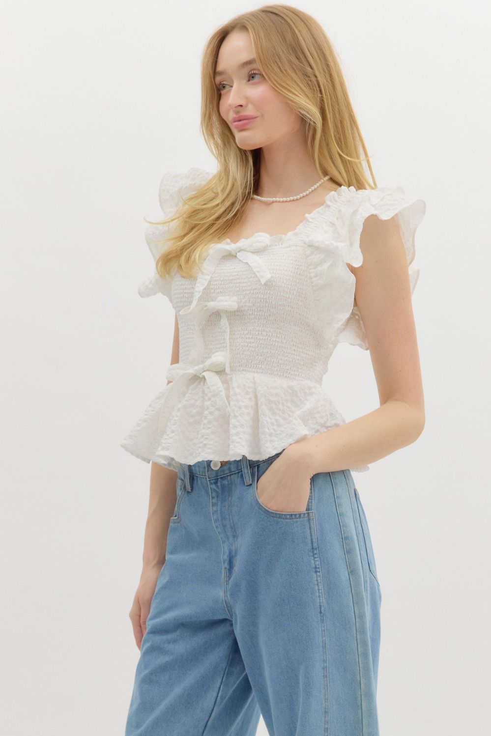 Luna – A Sweet & Textured Smocked Flutter Sleeve Top
