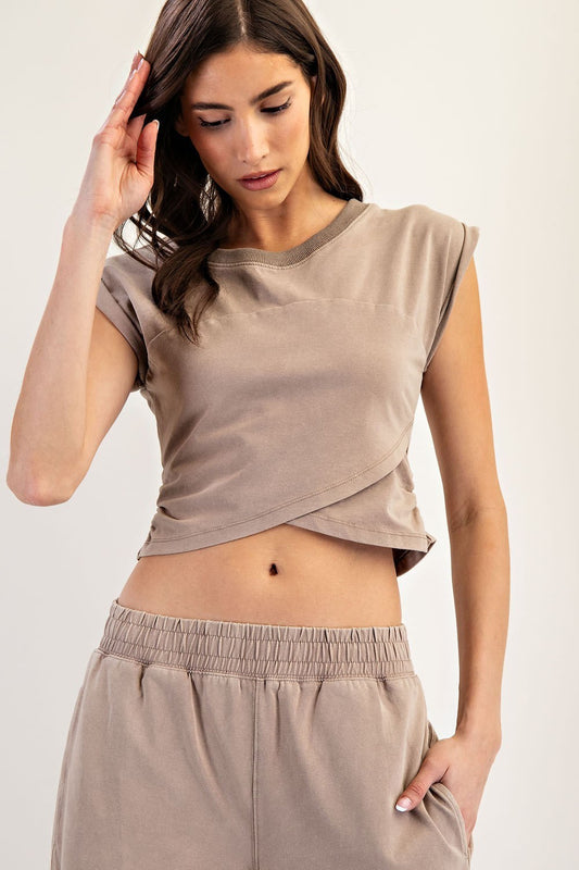 Mineral washed cropped wrap top with ruched side detail and cap sleeves.
