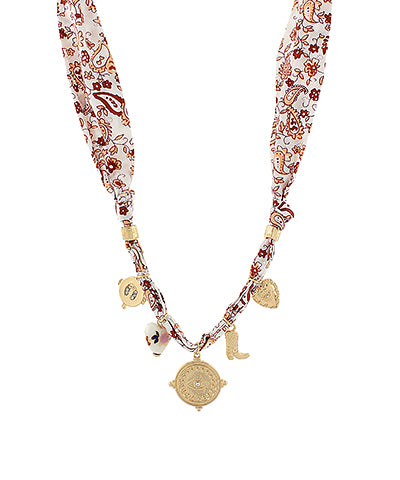 The Ismay Evil Eye Multi-Charm Necklace layers protective symbolism with modern sparkle.