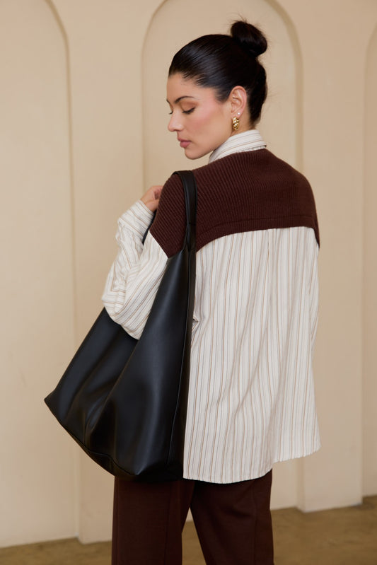 Oversized woven and knit mixed shirt with relaxed structure and soft texture.