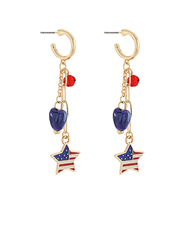 Pair of gold-tone drop earrings featuring a blue heart charm and a star charm with the American flag design hanging from delicate chains.