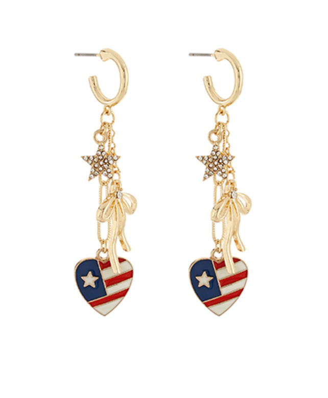 Pair of gold-tone drop earrings featuring a sparkling star, a delicate bow, and a heart-shaped charm with the American flag design.