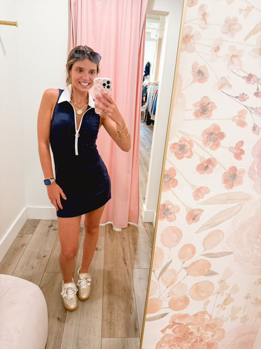 Preppy meets performance in this sleeveless, collared mini dress with a half-zip design. Crafted from moisture-wicking Pure Performance fabric with 4-way stretch, it’s perfect for on-the-go days that call for polished comfort.