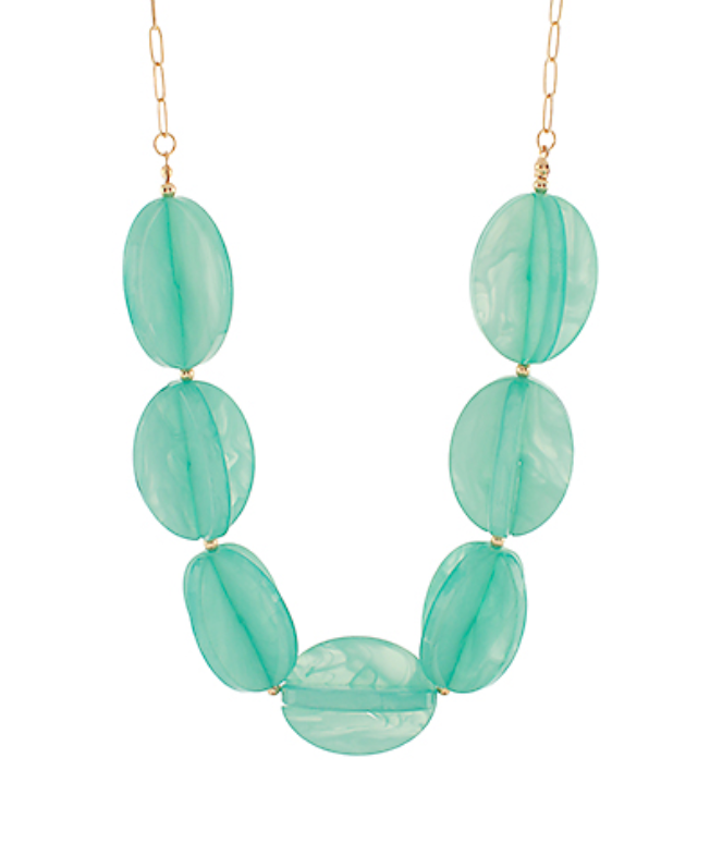 Short, chunky statement necklace featuring large, smooth, translucent teal beads strung together.