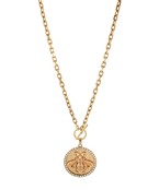Gold chain necklace with a round bee medallion pendant