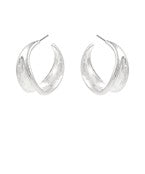Silver split hoop earrings with a sculptural, modern design on a white background.